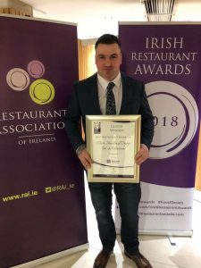 Edgars Ratniks collects the award at this year’s Irish Restaurant Awards for Digby's Bar and Restaurant - 2018 Best Restaurant Manager - Claire Macklin